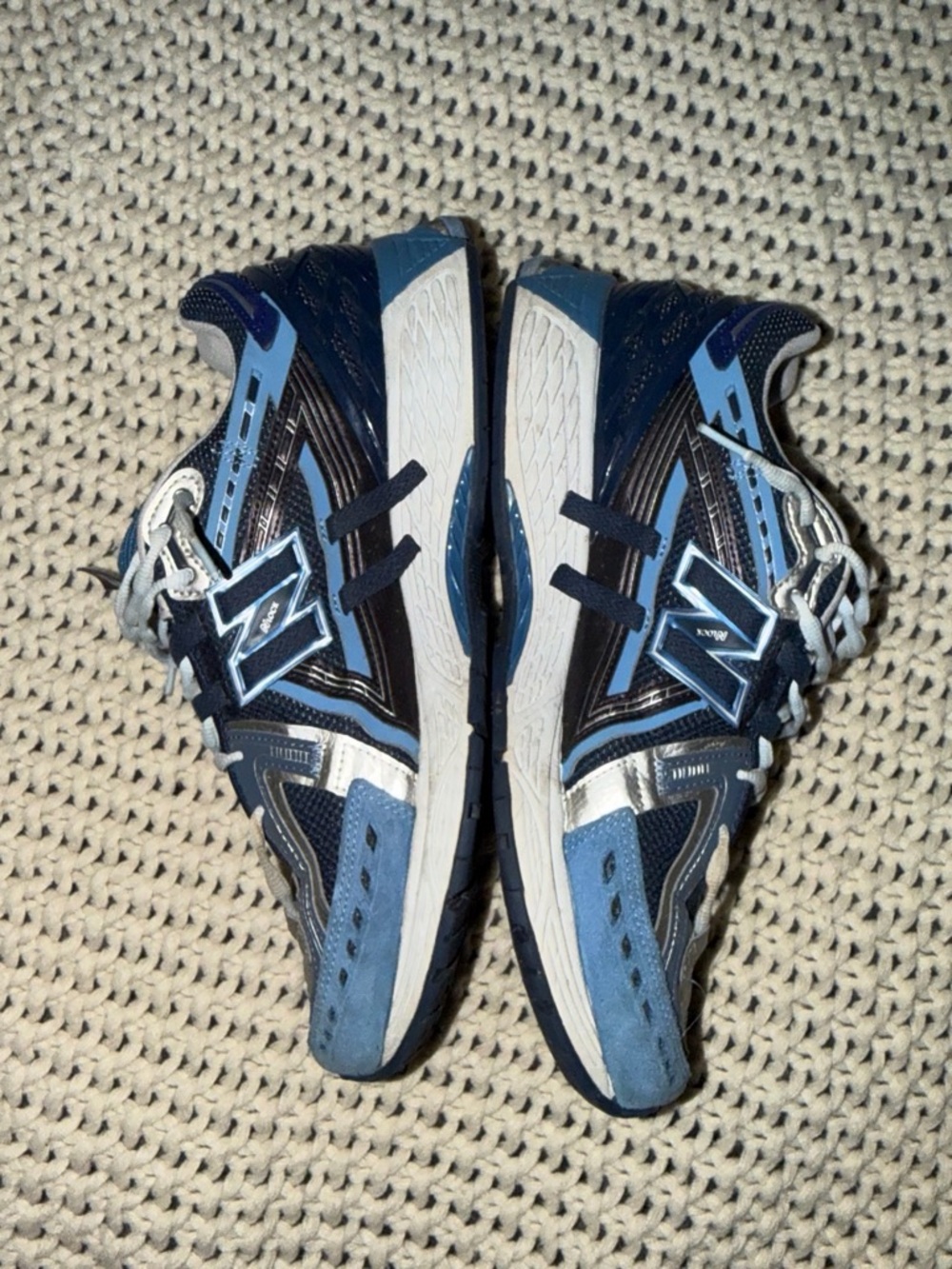 New Balance men’s Navy and Light Blue Athletic Sneakers